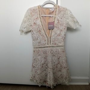 Lace romper. Missguided. NWT. Size 4.